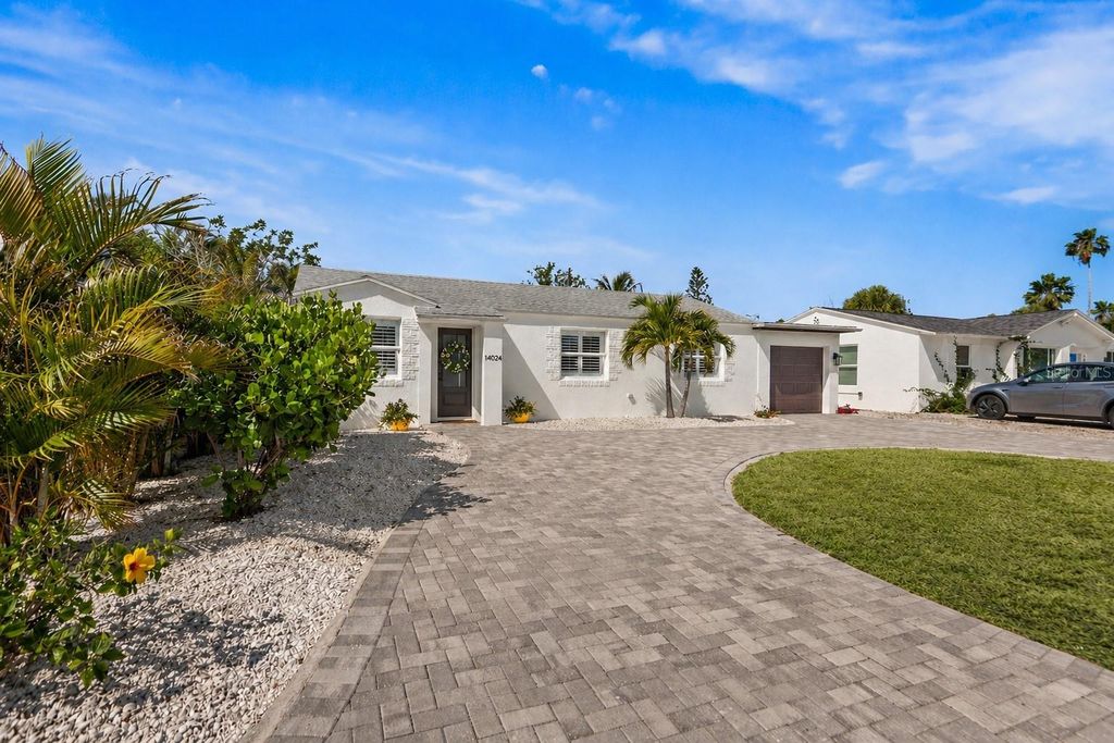 Photo of 14024 N Bayshore Drive, Madeira Beach, FL 33708 (MLS # TB8499731)