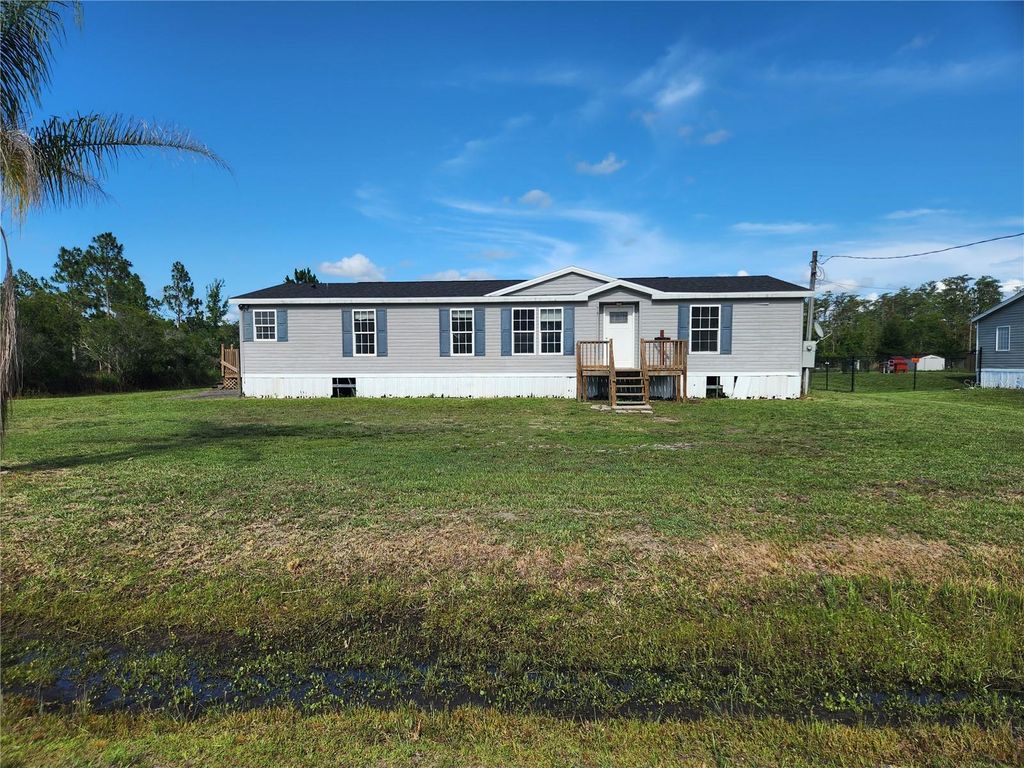 Photo of 5165 Topeka Avenue, Saint Cloud, FL 34773 (MLS # S5152897)