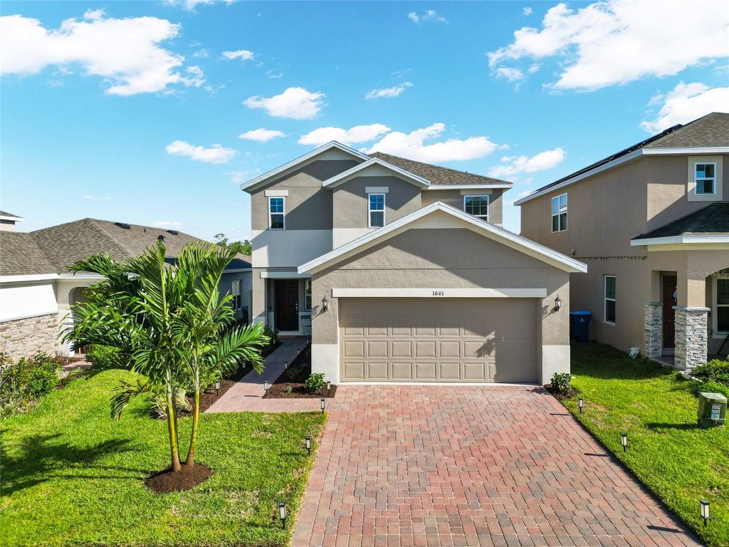 Photo of 1601 Swan Swim Drive, Davenport, FL 33837 (MLS # TB8494970)