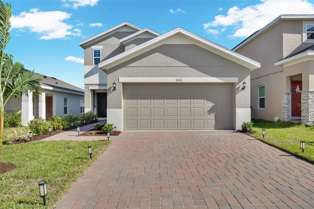 Photo of 1601 Swan Swim Drive, Davenport, FL 33837 (MLS # TB8494970)