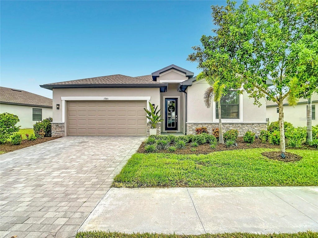 Photo of 1785 Saddlewood Circle, Port Charlotte, FL 33953 (MLS # O6447764)
