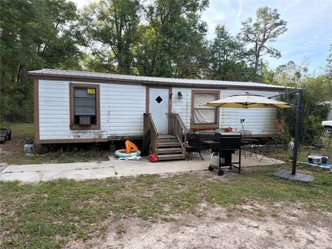 Photo of 430 Margaret Street, Bronson, FL 32621 (MLS # TB8504892)