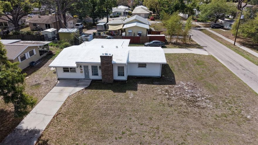 Located on a large corner lot in the heart of Arlington Park, this classic Old Florida mid-century home offers an exceptional opportunity in one of Sarasota’s most desirable neighborhoods. Whether you’re looking to renovate and restore its charm or build a custom home, the property provides the ideal setting in a highly sought-after location. Enjoy true walkability with the YMCA just one block away and Arlington Park only two blocks away, featuring walking trails, tennis and pickleball courts, and a heated Olympic-size swimming pool. The neighborhood is known for its mature trees, quiet streets, and close proximity to everything Sarasota has to offer.

Just five minutes to Sarasota Memorial Hospital and the vibrant shopping, dining, and cultural attractions of downtown Sarasota, and within easy reach of Sarasota’s world-renowned arts and entertainment scene, including the Van Wezel Performing Arts Hall and The Ringling Museum of Art.Only 15 minutes to the world-famous beaches of Siesta Key, as well as the waterfront dining, boutique shopping, and island lifestyle of St. Armands Circle and Lido Key.

This property offers the rare opportunity to enjoy quick access to everyday conveniences, outdoor recreation, Sarasota’s celebrated arts and culture, and the Gulf Coast’s best beaches, all while creating the home or investment vision that fits your needs.