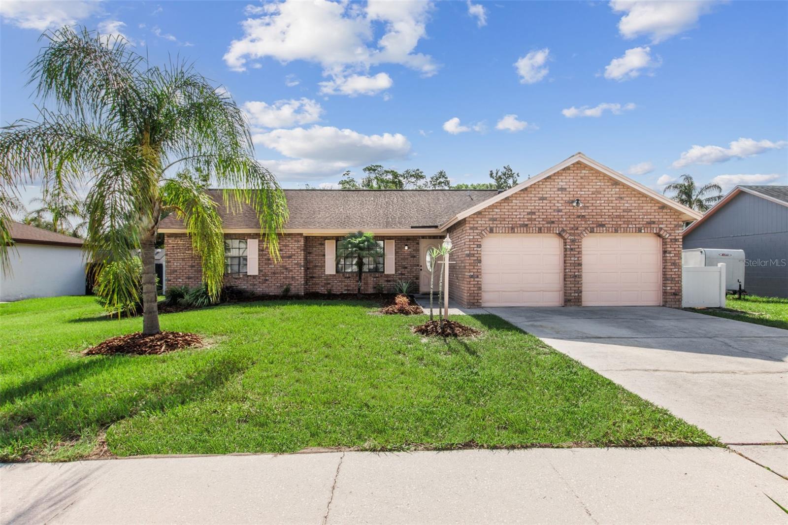 Nestled in the highly desirable Winter Park, Florida, 2008 Nottingdale Lane presents a meticulously updated and move-in-ready single-family home. This delightful residence offers 3 bedrooms and 2 bathrooms within a comfortable 1,278 square feet of living space, all without the encumbrance of a Homeowners Association (HOA). Situated on a generous 0.24-acre lot, the property boasts a fully fenced rear yard, providing privacy and ample space for outdoor enjoyment. Built in 1980, the home features classic block construction complemented by an appealing brick front exterior, ensuring enduring quality and curb appeal. Step inside to discover a functional layout designed for contemporary living. The heart of the home, the kitchen, has been beautifully updated with stainless steel appliances, gleaming granite countertops, and an abundance of rich wood cabinetry. The spacious master suite offers a private retreat, complete with sliding doors providing direct access to the rear patio, while the master bathroom has been elegantly remodeled. An expansive screened lanai extends the living space outdoors, creating an ideal setting for entertaining, al fresco dining, or simply relaxing in the Florida sunshine. This home is truly turnkey, featuring a freshly painted interior and exterior, an updated electrical panel, and modern lighting and fixtures throughout. Significant recent upgrades include a new water heater installed in July 2025, an AC system from 2018, and a roof from 2011, providing peace of mind for years to come. The established neighborhood offers unparalleled convenience to major roadways including 417, 436, Red Bug Lake Road, and Howell Branch Road, ensuring effortless commutes. Enjoy easy access to a diverse array of restaurants, shopping destinations, and local amenities, all while benefiting from the desirable Seminole County school district. This exceptional property offers a prime opportunity to experience the quintessential Winter Park lifestyle.