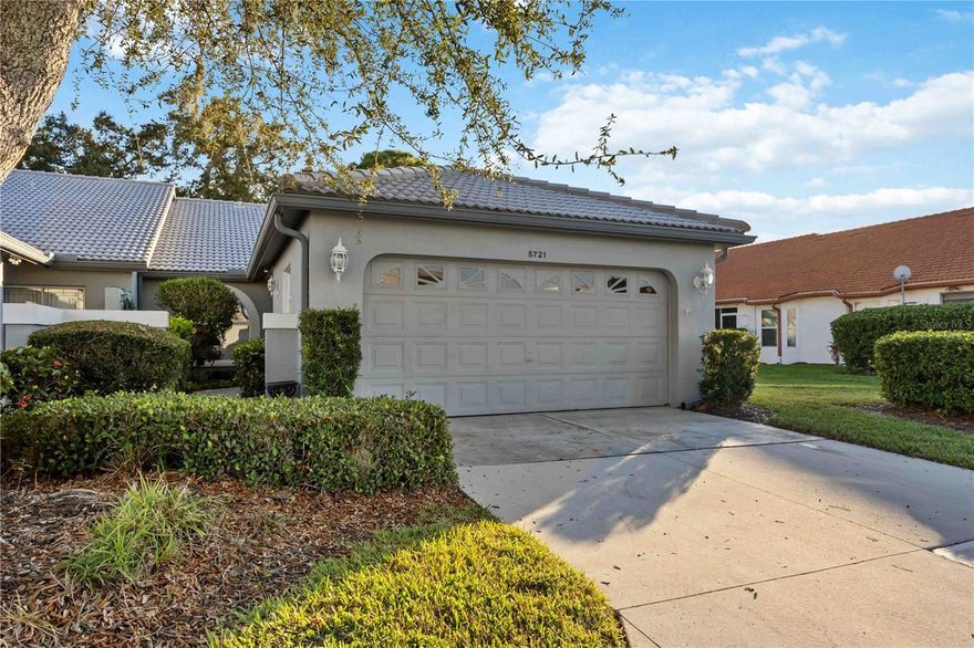 Welcome to Casa de Sol, where comfort, privacy, and easy Florida living come together in one of the community’s most desirable settings. This beautifully maintained 2-bedroom, 2-bath end-unit villa offers a thoughtful layout and serene surroundings, backing to a beautifully treed conservation area for a peaceful and private backyard.
The spacious primary suite features a walk-in closet, vaulted ceiling and a private en suite. The fully enclosed porch overlooks lush, abundant foliage, creating a tranquil extension of the living space. One of the largest front courtyards in the community enhances the home’s outdoor appeal and privacy. Additional highlights include hurricane shutters, a two-car garage with ample storage, and a partially furnished interior with a fully equipped kitchen, making this residence truly move-in ready.
Casa de Sol is a non-age-restricted community offering resort-style amenities, including a clubhouse with fitness center, community pool, tennis courts and scenic walking paths along the lakes. Whether you’re seeking a full-time residence or a seasonal retreat, this inviting villa delivers comfort, versatility, and peace of mind in a beautiful, amenity-rich setting.