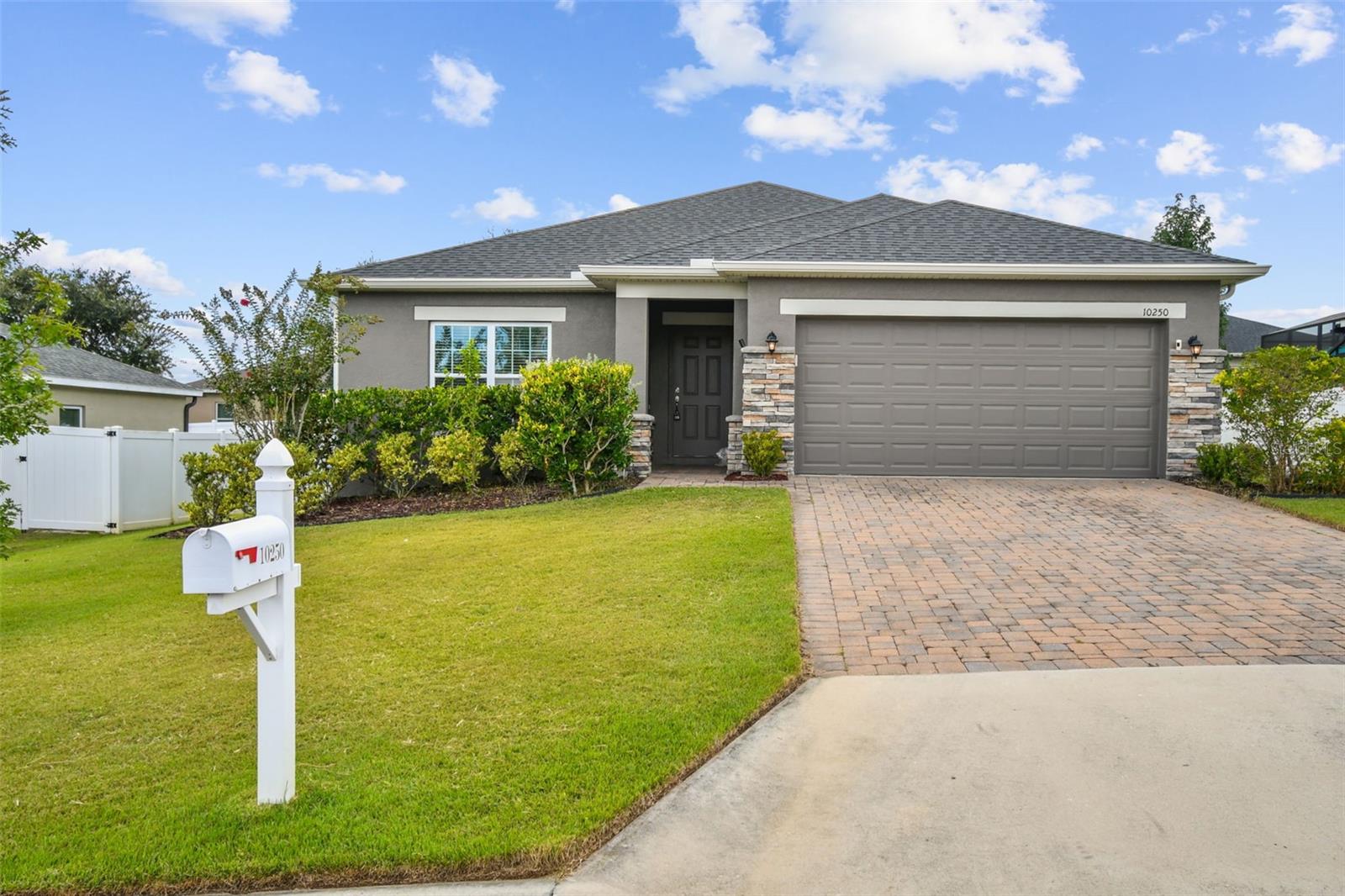 Get ready for a home that truly stands out among the competition. Every upgrade here was chosen to enhance your life. From the moment you pull up to the driveway, the curb appeal is on point. Inside, you will absolutely love how bright and airy this open concept 4 bedroom 2 bath home feels, You'll definitely enjoy the clean, modern look of new wood plank tile flooring & high ceilings throughout. The master bedroom is a sanctuary of style with beautiful teak wood flooring. The en-suite bath features a soaking tub and new seamless glass shower making you feel like you live in a five-star hotel. Say goodbye to clutter with a custom California Closet—your personal organization solution. The exterior has been given a fresh coat of paint, boosting its already fantastic curb appeal. The best part? The backyard is a zero-effort dream. With lush Zoysia grass and Herb, your robotic lawn mower that's included in the sale, your weekends are officially free. This home isn’t just a place to live; it's an invitation to a more relaxed and beautiful life. The community is gated for added security.
Centrally located in the heart of Clermont, you are only 10 minutes from all the fun in downtown Clermont! Some of the best shopping, dining, and entertainment is all just within a quick 15 minute ride. You really can't find a better value for the location! Come see this gem today!