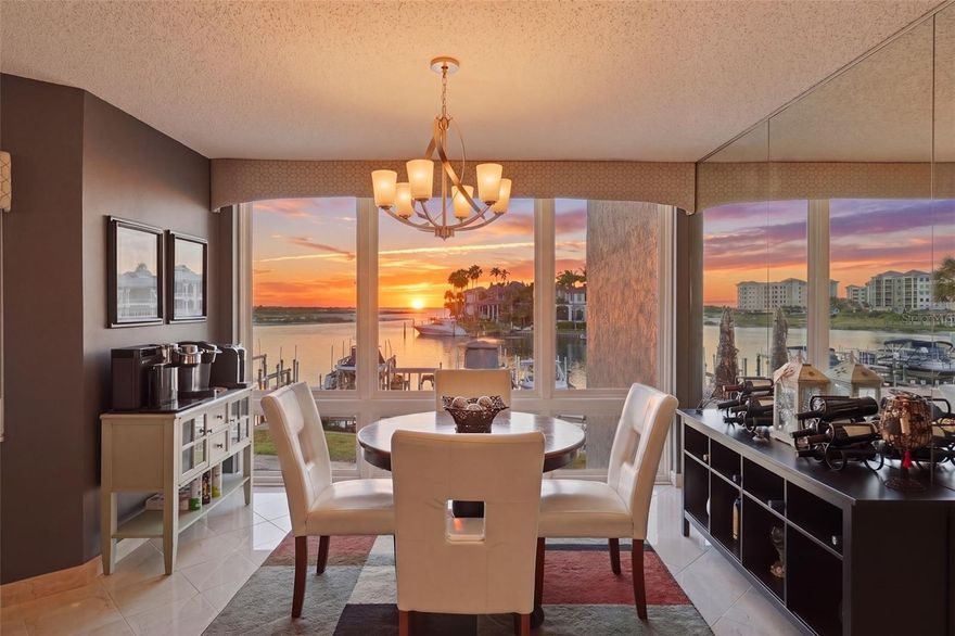 The rarest combination of gorgeous, direct Gulf views and deep, protected boating water is available in this updated, single-level, fully furnished residence at Cove on the Gulf, a boutique complex on Tierra Verde’s Grand Canal. The unit includes a slip with a 10,000 lb lift, and its supreme placement offers immediate access to the Gulf, the Pass-a-Grille Channel, and the Intracoastal. Positioned toward the south end of the building, Unit 204 captures sweeping views across the canal to Shell Key Preserve and the Gulf of Mexico beyond. 

Inside, a contemporary aesthetic and an open great-room floor plan create a light, easy interior that lets the water take center stage. The living area opens to a spacious balcony with glass railings that maximize the view — sunsets, dolphins, and the daily parade of boats become part of your daily routine. A wood-burning fireplace keeps you warm on the few cold winter nights, and hurricane protection is in place throughout. Elevator access and thoughtful interior updates make this your effortless home from day one. Cove on the Gulf is a boutique community of just sixteen residences, with a heated waterfront pool and spa, fishing pier, covered parking, and under-building storage for kayaks and paddleboards.

Tierra Verde is what makes a home like this so rare. The island offers a quiet, residential rhythm: walk to local restaurants, the Tierra Verde Marina, and the Island Grille, bike the trails to Fort De Soto’s 900+ acre park and the world-class beaches of St. Pete Beach. Yet downtown St. Petersburg is close at hand, with its museums, arts scene, waterfront parks, and renowned dining. It’s the rare address that delivers both the laid-back island life and immediate access to one of Florida’s most exciting cultural destinations, with Tampa International Airport an easy drive beyond. Homes like this – with direct Gulf views, deeded slip, single-level, fully furnished, in a sixteen-unit building — don’t surface often.