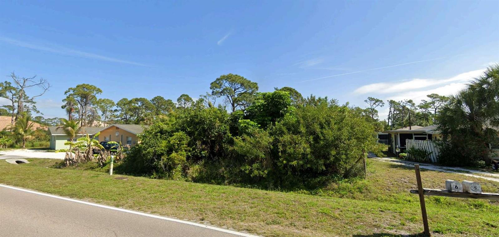 Nearly ½ Acre of Vacant Land in Englewood, FL – No HOA! Located in a desirable X Flood Zone, this spacious RSF3 Zoned lot offers the perfect opportunity to build your dream home in a peaceful, sought-after neighborhood. Public water and sewer are easily accessible, and with no HOA fees, you can design and build without added restrictions or costs. The property is considered a “thru” lot- meaning it fronts two point of right of way (Old Englewood & Morrison Ave). The setbacks are as follows: 20 feet from the front property lines ( Old Englewood Rd & Morrison Ave) 15 foot combination on the sides with one side meeting a minimum side setback of 6 feet. Just minutes from Gulf beaches, scenic parks, golf courses, and vibrant local culture, this property is ideal for outdoor and coastal living. Seller will cover the owner’s title policy—don’t miss your chance to own a slice of paradise in Englewood.