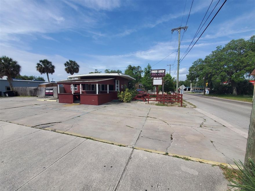 High visibility & central location make this the perfect place to relocate your existing business to or start your new business!  Walking distance to Canal Street and one block off of N. Dixie Freeway on the cut through to North Causeway and the Beachside Flagler Avenue!  Mixed use zoning allows a lot of flexibility and a variety of uses from professional offices to restaurants to retail!  Approximately 781 gross square feet available to customize to your needs.  Current improvements on the property include a separate kitchen room with a hood, sinks, fire suppression system and exterior access to a rear storage room.  There is an additional lobby area and reception counter/register area.  Exterior tables provide for dining on premises.    Additional storage is provided by the fenced in section of the property that has a nice storage shed. ;Water: City