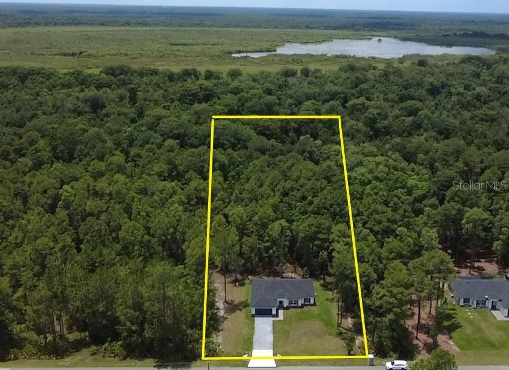 Photo of 42021 Tamarac Street, Eustis, FL 32736 (MLS # O6422394)