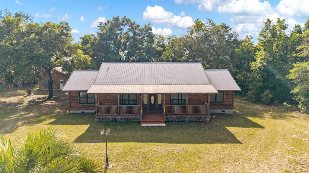 Photo of 1230 SW Valencia Heights Avenue, Dunnellon, FL 34431 (MLS # OM723493)