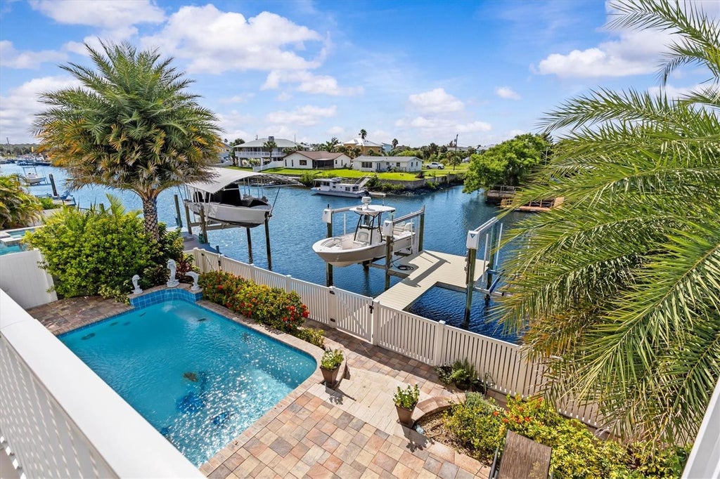 Photo of 4030 Gulf Coast Drive, Hernando Beach, FL 34607 (MLS # W7889378)