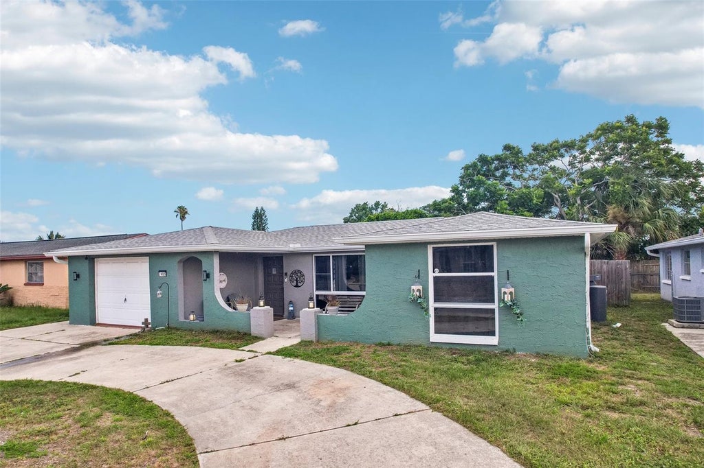 Photo of 7405 Westcott Drive, Port Richey, FL 34668 (MLS # TB8520915)