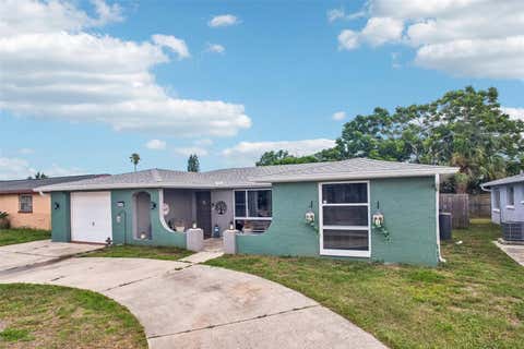 Photo of 7405 Westcott Drive, Port Richey, FL 34668 (MLS # TB8520915)