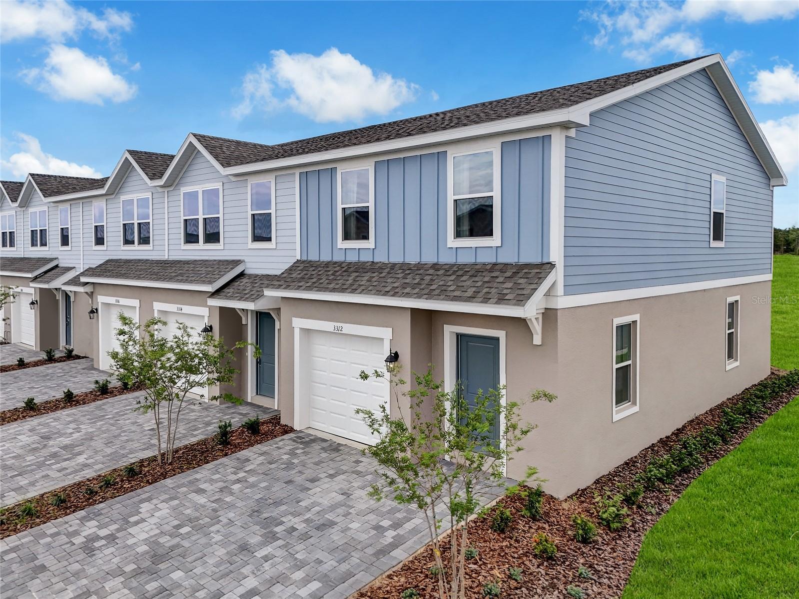 One or more photo(s) has been virtually staged. Under Construction. Stanley Martin is proud to introduce newly constructed townhomes in the vibrant Avalon Park Tavares Phase Two community, located in the heart of Tavares, Florida. Avalon Park Tavares is a quaint live-work-play community featuring tree-lined streets, waterways, and small-town charm. Stanley Martin Homes offers affordable living and a modern townhome design, blending convenience and style with the timeless appeal of this unique neighborhood. As part of this 155-acre community, homeowners will enjoy retail and recreational spaces focused on the health and well-being of its residents. Nestled within the serene landscape of Lake Hermosa, Avalon Park Tavares combines a lifestyle where homeowners feel connected to their neighbors and invested in their community. Market Street will be the center of it all, where shopping, dining, and recreation options will be abundant. Not limited to Market Street, Avalon Park Tavares has acres of parkland, walking trails, lakes, and more.
Stanley Martin presents the Rosalia, a new two-level townhome design with a smart open-concept layout, a one-car garage, and energy-efficient features ideal for both hosting and relaxing. The first floor reveals a spacious kitchen with a walk-in pantry for extra storage, a dining area, a great room, and a powder room. Upstairs, discover a primary suite with a walk-in closet and a bathroom with a double vanity, along with a conveniently located laundry room to avoid carrying clothes up and down the stairs. Utilize the two additional bedrooms upstairs for family, friends, or guests. Rosalia strikes a harmonious balance between low-maintenance living and the spaciousness of a single-family home.