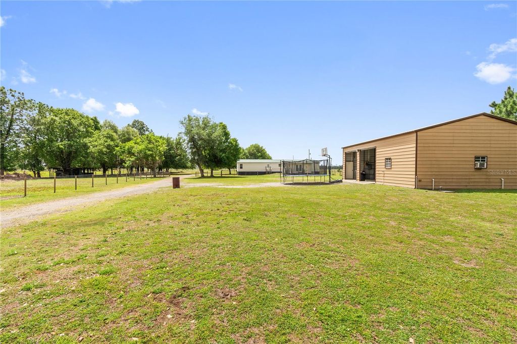 Photo of 5051 Deen Still Road, Polk City, FL 33868 (MLS # L4960762)