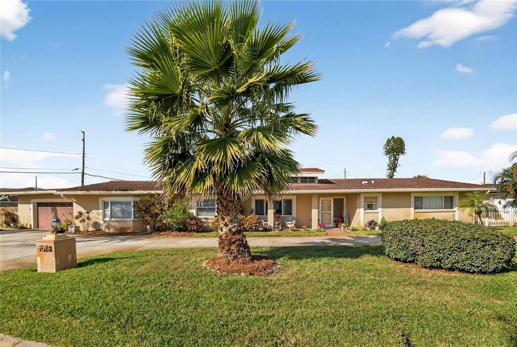 Photo of 6518 Debbie Lane S, St Petersburg, FL 33707 (MLS # TB8462979)