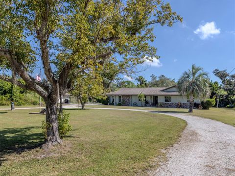 Photo of 1110 Gladstone Boulevard, Englewood, FL 34223 (MLS # N6141072) Photo of 1110 Gladstone Boulevard, Englewood, FL 34223 (MLS # N6141072)