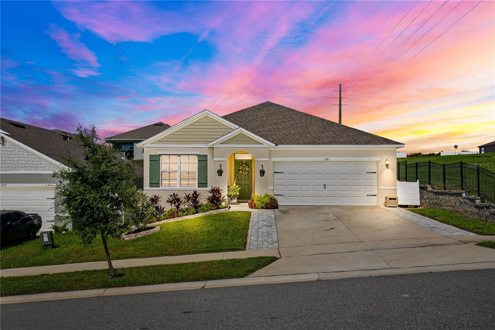 Welcome to this beautifully maintained 3-bedroom, 2-bathroom, newly built in 2023, home in Arborwood community of Clermont! The Aria floor plan by DR Horton offers a perfect blend of style, comfort, and convenience, this property sits on an elevated lot with a fully fenced backyard and no immediate right side neighbors for added privacy. Step inside to find an open-concept layout with a bright and airy feel. The gourmet kitchen is a showstopper, featuring granite countertops, a stone-accented island with breakfast bar seating, stainless steel appliances, a stylish backsplash, and plenty of cabinet space. The kitchen flows seamlessly into the dining and living areas, making it perfect for entertaining. Enjoy Florida living at its finest in the screened lanai or on the extended paver patio—ideal for grilling, relaxing, or hosting friends. The spacious backyard is enclosed with decorative fencing and surrounded by lush landscaping.
Home includes: Granite Counters, 18" ceramic tile, 36" cabinets & LED Lighting. Control your home with our "Home Is Connected" Smart Home package featuring: porch light switch, front door lock, thermostat, doorbell camera, touch screen control hub, Deako Smart switches. You will Save Money with this all block constructed, energy efficient new home complete with 15 Seer AC, dual pane low-E windows. Schedule a private showing today!