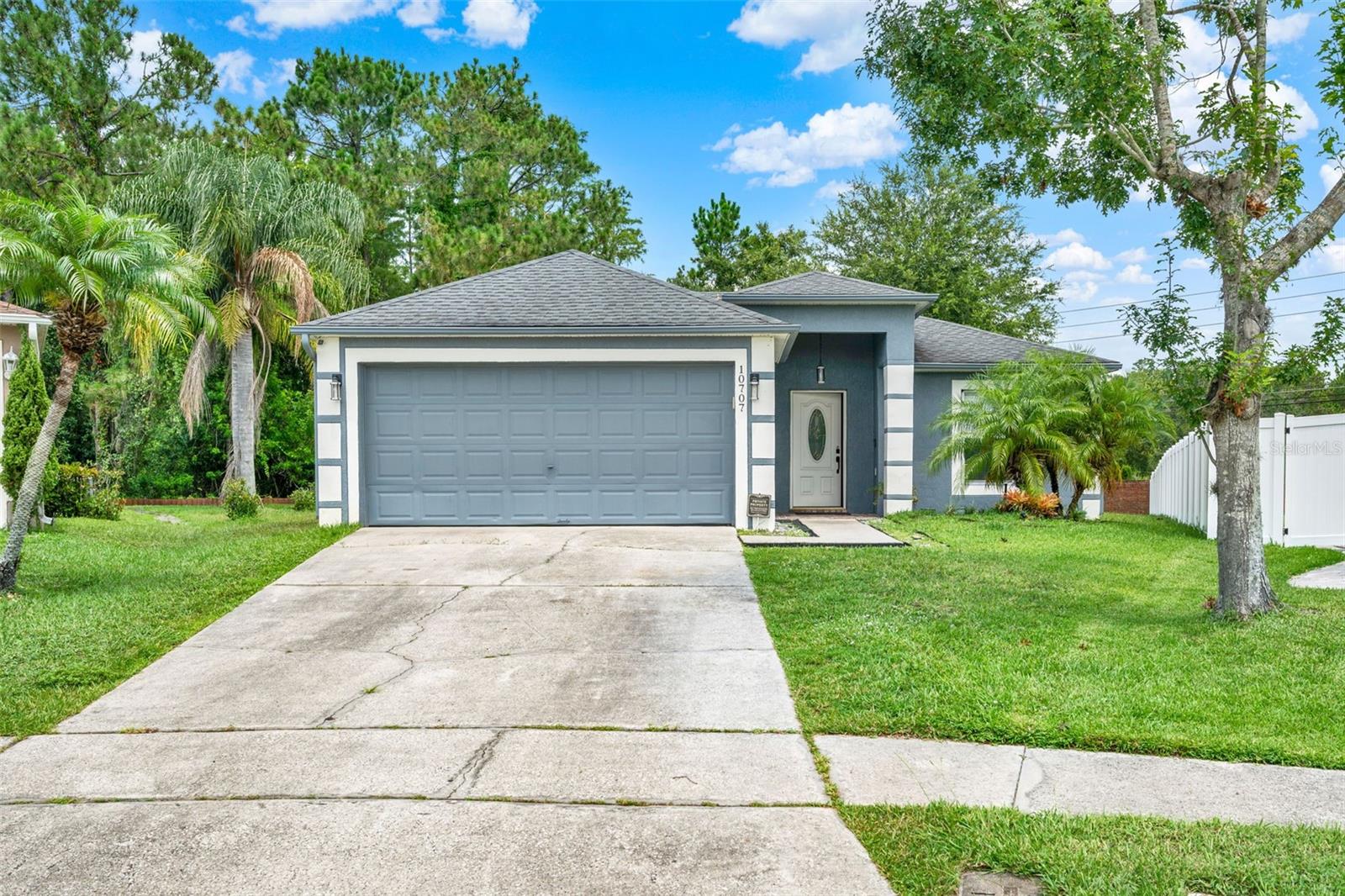 Impeccably maintained 3-bedroom, 2-bathroom home available for rent. Situated in a central location with easy access to major highways including Central Florida Greenway (417), East-West Expwy (408), and E. Colonial Dr. (50). Nearby amenities include Valencia College and University of Central Florida (UCF). Tucked away in a quiet cul-de-sac within Andover Lakes, this home boasts a spacious living room with an open concept design. Complete with stainless-steel appliances, a washer and dryer in the garage for added convenience, and a kitchen featuring soft-close cabinets, granite countertops, ample counter space, and a separate pantry. The generous master bedroom offers a sitting area, garden tub, and a separate shower. Recent updates include a new AC and roof, making this home move-in ready. Enjoy the tranquility of no backyard neighbors as the property backs up to a conservation lot. The screened-in porch is perfect for cookouts and unwinding after a long day. Pets are not permitted; a minimum one-year lease and successful background check are required. Applicants over 18 years old are subject to a $100 application fee.