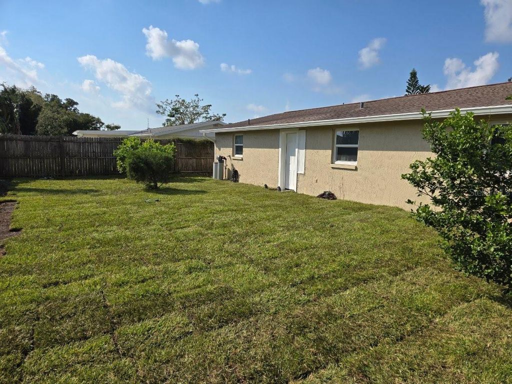 Photo of 7810 Birchwood Dr, Port Richey, FL 34668 (MLS # TB8455223)