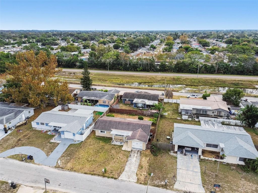 Photo of 7810 Birchwood Dr, Port Richey, FL 34668 (MLS # TB8455223)