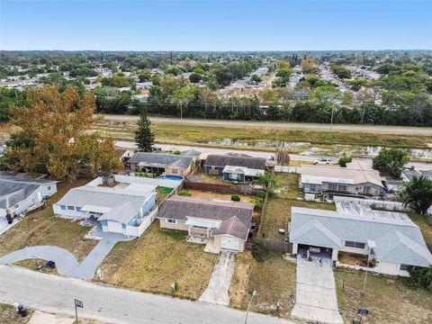 Photo of 7810 Birchwood Dr, Port Richey, FL 34668 (MLS # TB8455223)