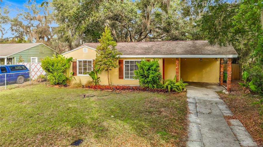 Welcome home to this bright and inviting 3 bedroom, 2 bath home in the highly sought-after Seminole Heights neighborhood. Just a few blocks from some of Tampa’s best restaurants, coffee shops, and nightlife, this home blends classic neighborhood charm with modern updates in all the right places. Inside, you’ll find a desirable split floor plan that offers privacy and flexibility, ideal for families, roommates, or a home office setup. The living areas are filled with natural light, highlighted by all-new laminate flooring that runs throughout the home for a clean, cohesive look. The updated kitchen features new cabinets and countertops and flows easily into the dining room, where French doors open directly onto a spacious back deck—perfect for indoor-outdoor entertaining. Both bathrooms have been beautifully remodeled with fresh finishes, giving the home a move-in ready feel. Step outside to a large, fully fenced backyard with mature shade trees, offering plenty of room for pets, gardening, or weekend gatherings. A convenient carport provides covered parking and additional storage potential.
Location is everything here: approximately 10 minutes to Downtown Tampa, USF, and Tampa Int'l Airport. Enjoy the best of urban living and neighborhood charm in one of Tampa’s most vibrant, historic communities. This Seminole Heights gem is ready for its next owner—don’t miss it!