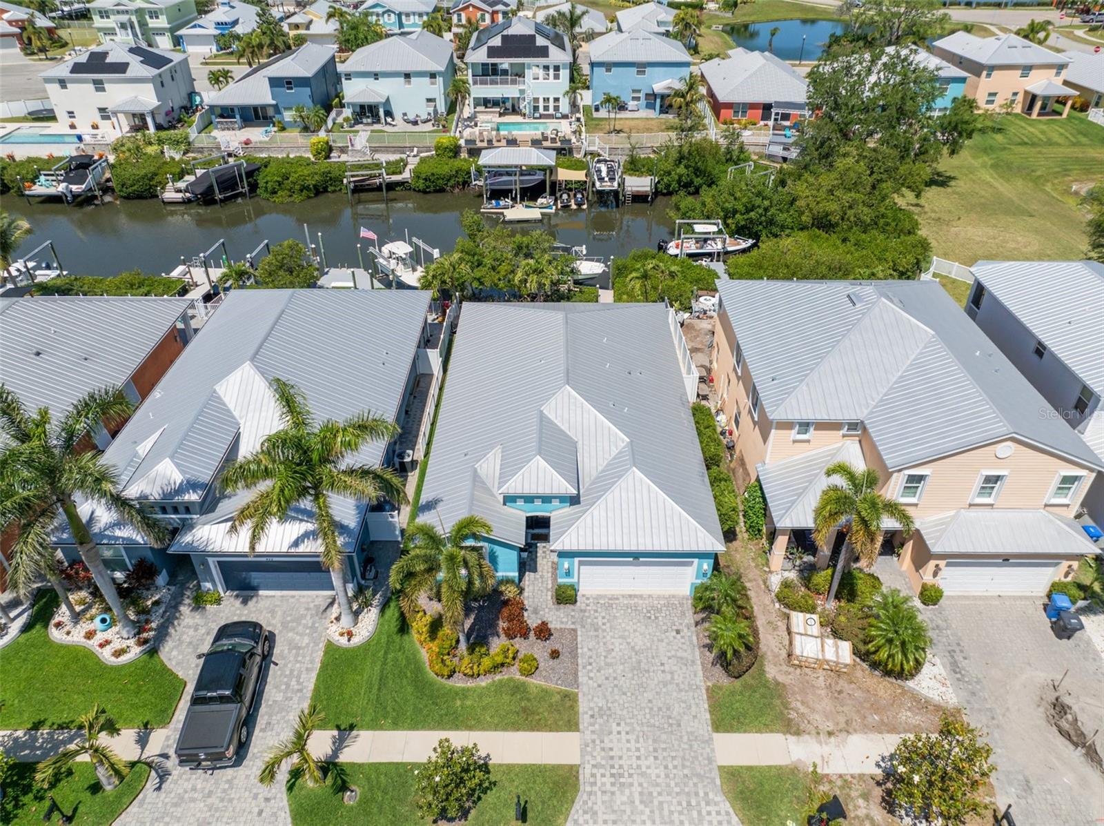 Live the ultimate Florida waterfront lifestyle at 424 Bahama Grande Blvd , nestled in the exclusive, gated community of Bimini Bay in Apollo Beach. This beautifully updated 4-bedroom, 3-bath home offers the perfect blend of comfort, style, and coastal convenience. Zoned for Apollo Beach Elementary , an A-rated soon to be K-8 approved school, this property is ideal for families seeking top education and serene living. Step inside to a bright, open-concept layout with soaring ceilings, a fully upgraded kitchen featuring quartz countertops and stainless steel appliances, and a spacious primary suite with a spa-inspired bathroom and walk-in closet. Recent updates throughout the home add modern touches and peace of mind. Out back, paradise awaits. Enjoy your private waterfront retreat complete with a 13, 000 lb boat lift, a powered dock, and a relaxing hot tub that conveys all with no rear neighbors and no flooding during recent hurricanes.