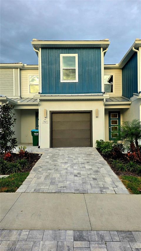 Photo of 7821 Spectrum Drive, Reunion, FL 34747 (MLS # O6364625)