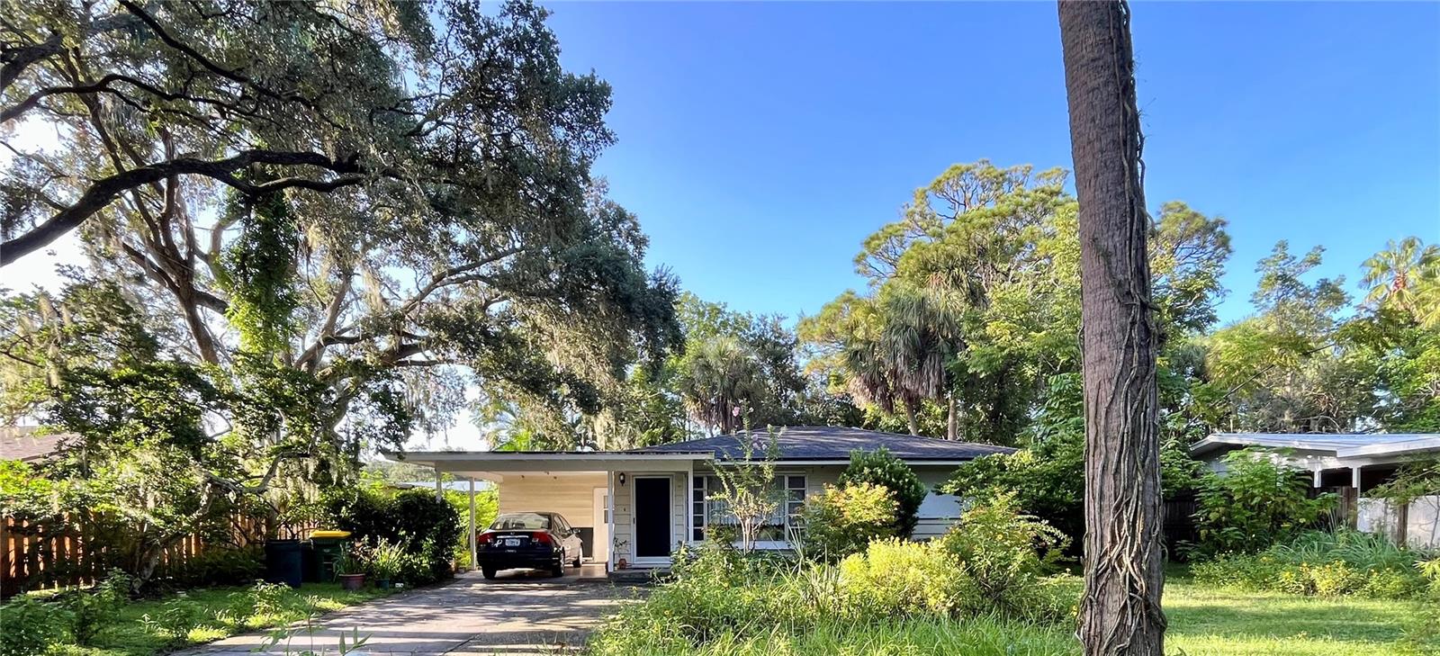 Million Dollar neighborhood. Attention Investors or Handyman! Great LOCATION on peaceful, DEAD END STREET, walkable to beautiful Arlington Park with its trails, dog park and playground. Within city limits, close to downtown shopping and restaurants, beaches, and St Armands Circle, yet peacefully hidden from traffic and busyness. Perfect place for familiy home, build the home of your dreams. Home presently needs TLC. Property could be landscaped to become a peaceful haven with pool and spa in back.