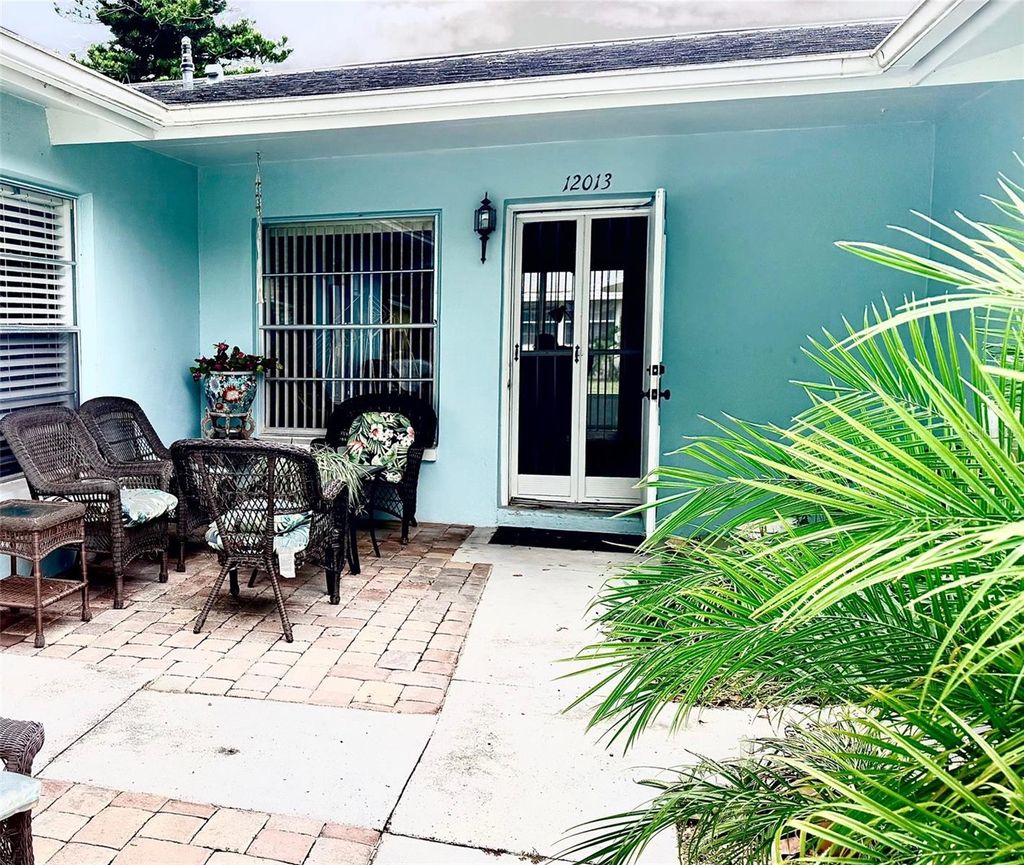 Photo of 12013 Boynton Lane, New Port Richey, FL 34654 (MLS # TB8446090)