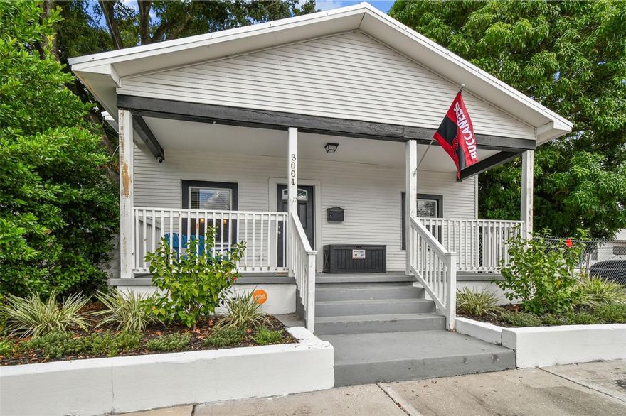 YBOR CITY'S FINEST BUNGALOW !!  GORGEOUSLY RENOVATED!!!!!   Fabulous front porch to enjoy the summer evenings!    Sensational OPEN CONCEPT floor plan with gorgeously renovated kitchen .  CUSTOM granite and design!   Sizzling glass tile backsplash!  STAINLESS STEEL appliances all included!   Spacious living room with plenty of room for a home theater!   MODERNIZZZZZZZZZZZED  bathrooms with barn doors!   Fresh subway tile and custom light fixtures throughout!  4 bedrooms ..... plenty of space to convert a bedroom to a HOME OFFICE!   Laundry room with plenty of space for extra storage!   Incredible backyard with new sod for all your furry friends to enjoy!  Plenty of yard space to host Gasprilla Parties or events!  Come tour this gorgeous bungalow in the POPULAR YBOR CITY!  FULLY FENCED IN!!!   Easy commute to downtown Tampa , Westshore Business district,  Channelside district , Hyde Park and the Selmon Expressway!