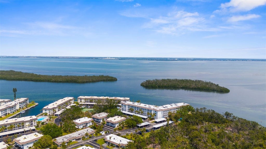 Photo of 600 Sutton Place #101B, Longboat Key, FL 34228 (MLS # C7531576)