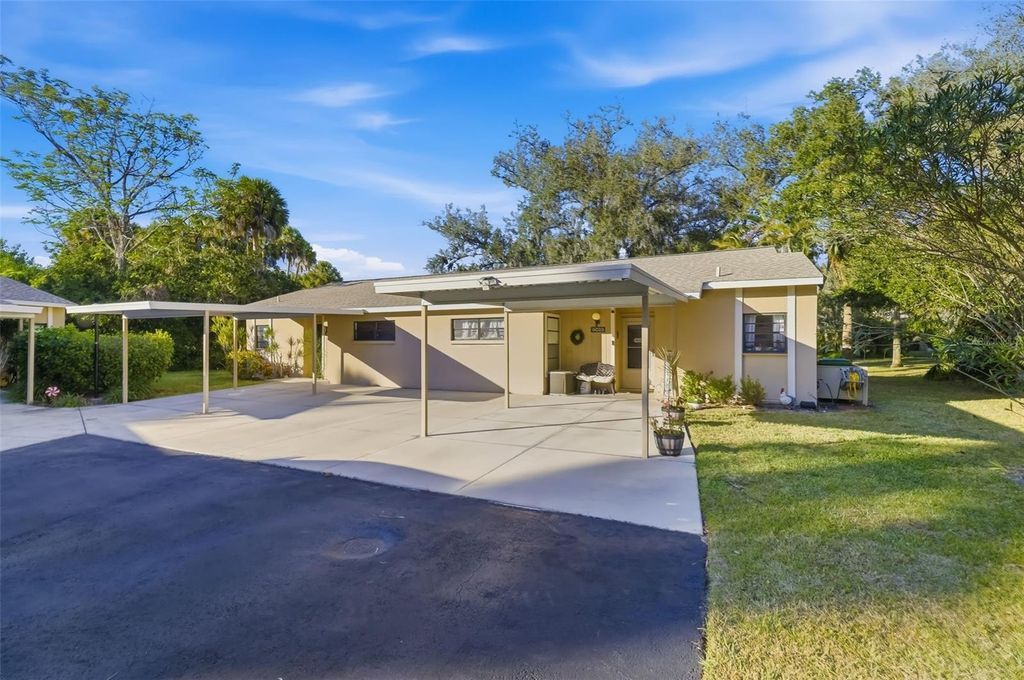 Photo of 5023 Village Gardens Drive #29, Sarasota, FL 34234 (MLS # A4686540)