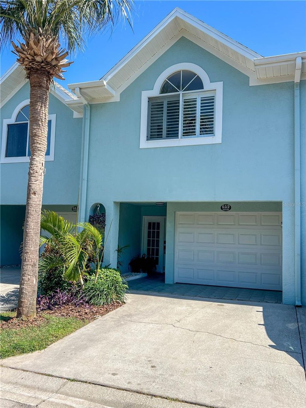 Photo of 659 Garland Circle, Indian Rocks Beach, FL 33785 (MLS # TB8390222)