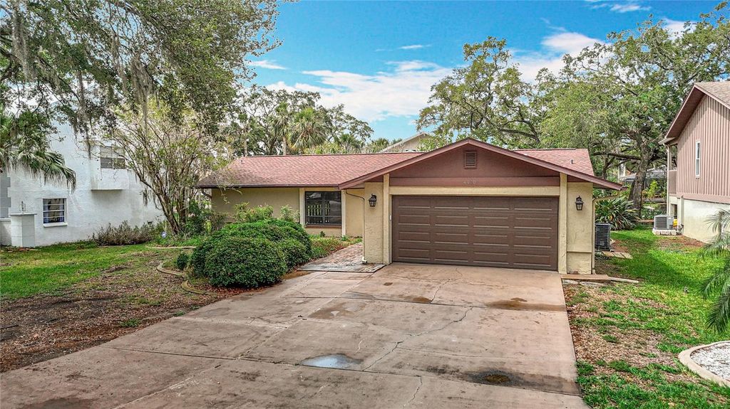 Photo of 4420 Marine Parkway, New Port Richey, FL 34652 (MLS # W7875491)