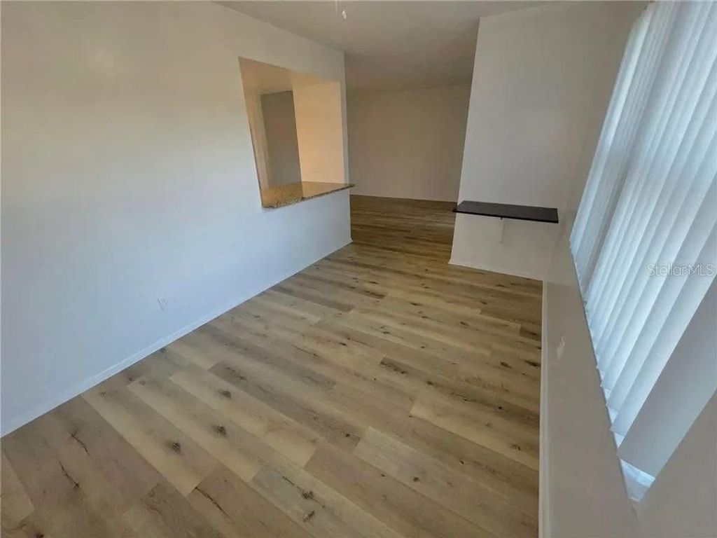 Photo of 9909 Sweepstakes Lane #4, Orlando, FL 32837 (MLS # S5147811)