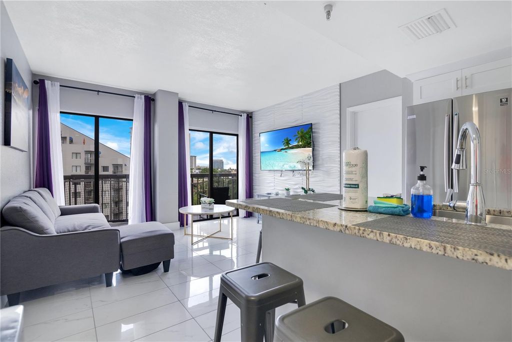 Photo of 6165 Carrier Drive #2605, Orlando, FL 32819 (MLS # O6389422)