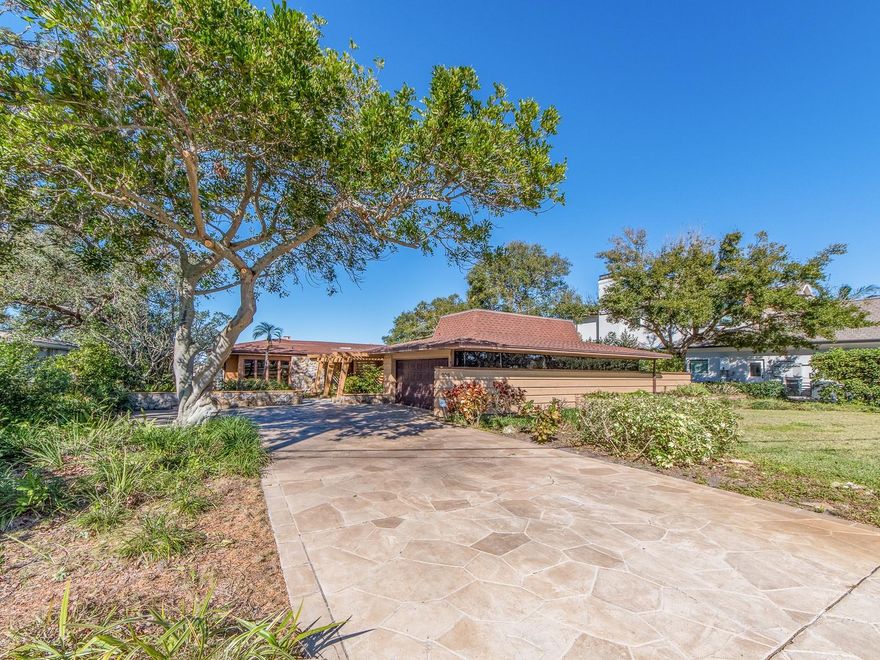 ELEVATION, ELEVATION,ELEVATION. This home is located on a bluff in the beautiful Harbor Bluffs subdivision. It is a extremely sought after property because of the rare elevation of these bluffs which do not exist in most of Pinellas County. The home was originally  built in 1955 as a small 2 bedroom home. The owners did a complete rebuild and expansion of this home according to tax records in or around 1982 to make it what it is today. The land is the key with 105 Ft. of waterfront and 241 feet in length. Your family can choose to make this home your own as it is or invest in a complete rebuild on this spectacular lot. Regardless of what you choose to do the value will be there after completion of your project. Located direct waterfront with access to the Gulf Of Mexico while still being protected water front property. The fabulous beaches are literally minutes away. The community sits nestled in with restaurants, banks, shopping, grocery stores and even the big box stores just outside the community. According to the flood map this property is zone x an area that is determined to be outside the 100-500 year floodplains. Buyers must rely on a current elevation certificate to be ordered during the contract period. The sellers have no knowledge of an accurate elevation nor do they have a current elevation certificate.