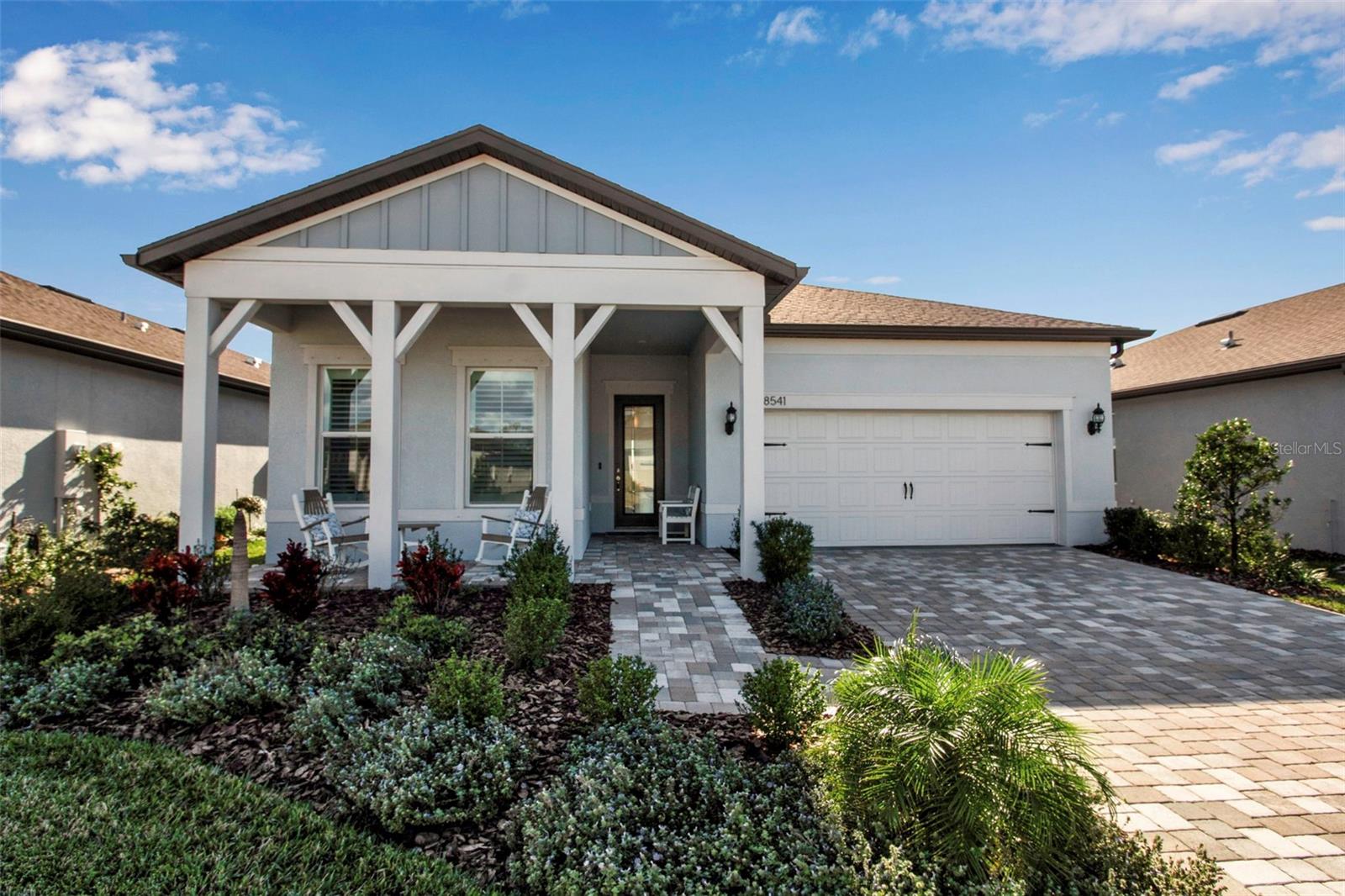 Now aggressively priced; grandson is wanting the sellers close! This Prestige floor plan is a favorite with its Craftsman elevation providing a truly useable front porch. Sellers enjoy the spectacular sunsets, double closets in the primary suite and the close proximity to the amenity center and Sailfish Grille. This two-bedroom plus flex room with 2.5 baths flows from room to room. Just by the kitchen-another huge closet that can be transformed into a wine closet or whatever your heart desires. The wall of sliders welcome in the softest light. Outside the sliders, a screened lanai invites relaxation. The garage floor is so much more than a standard epoxy and also has a 50-amp outlet installed for EV charging. The home has a whole house surge protection system. Sited in the center of a very active (and competitive) sports minded community, come see all this home has to offer! Builders 5- and 10-year warranties are transferrable AND closing with a slightly used resale is incredibly less expensive than closing with the builder! Located 1.5 miles from I75 and 275 making travel anywhere, easy.