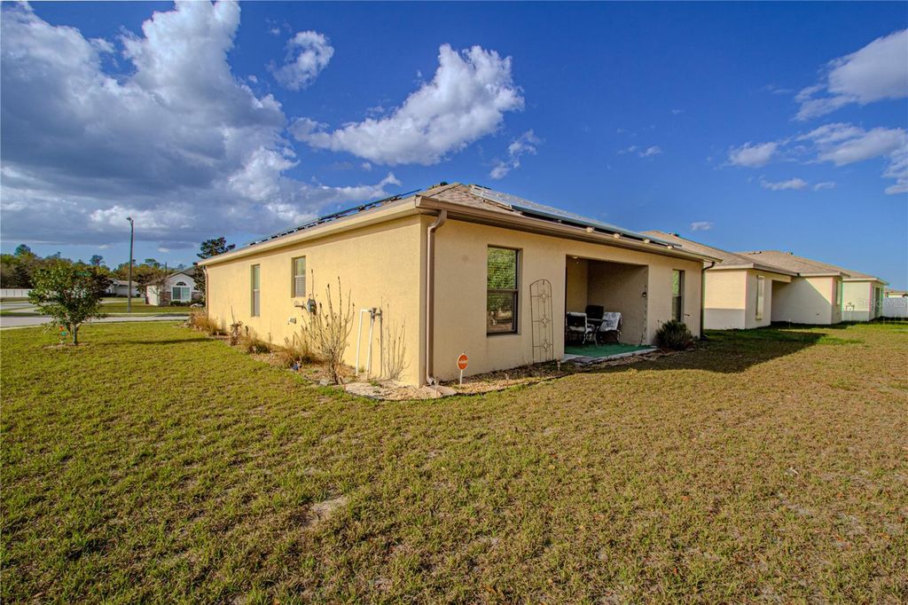 Photo of 3801 Arborvitae Way, Deland, FL 32724 (MLS # O6389600)