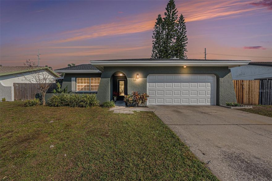 Completely remodeled Carrollwood home. No HOA or CDD! Updated from top to bottom with a brand-new 2025 roof, AC, and water heater. Interior upgrades include fresh paint, luxury vinyl flooring, new fixtures, and a stunning kitchen with white shaker cabinets, Calacatta Sunset quartz, stainless steel appliances, and a 12+ ft island. Both bathrooms are fully renovated, with the primary featuring a 60-inch double vanity. Enjoy a spacious living room with a wood-burning furnace and an open backyard with a sparkling pool. Located on a quiet street near a cul-de-sac, this move-in-ready home offers modern style, comfort, and convenience. Call for more details!