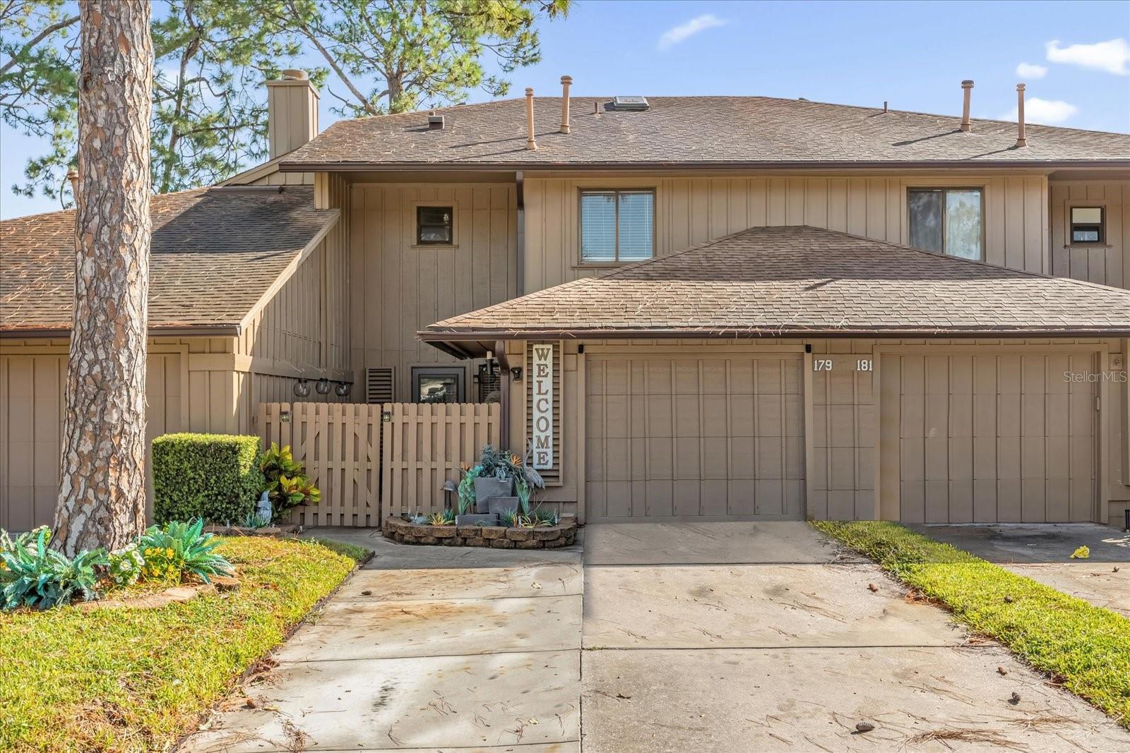 Welcome to this gorgeous Townhome located in the highly desirable Heron Cove community in the heart of Lake Mary! This beautifully maintained home features three spacious bedrooms, two and a half bathrooms, and a one-car garage, offering 1,618 square feet of comfortable living space. The inviting main floor boasts ceramic tile flooring throughout, a cozy fireplace, and an updated kitchen complete with all stainless steel appliances and a charming breakfast nook. Upstairs, you'll find all three bedrooms, including a generous primary suite with its own en-suite bathroom and private balcony. Step outside to your private, fenced-in backyard—perfect for pets—and enjoy relaxing on the covered patio. Residents of Heron Cove also enjoy access to a sparkling community pool. Ideally situated close to major shopping, I-4, and the 417, this home is just 30 minutes from both Orlando and Florida’s stunning beaches, making it the perfect location for work, play, and everything in between. Don’t miss the opportunity to call this exceptional property your new home!