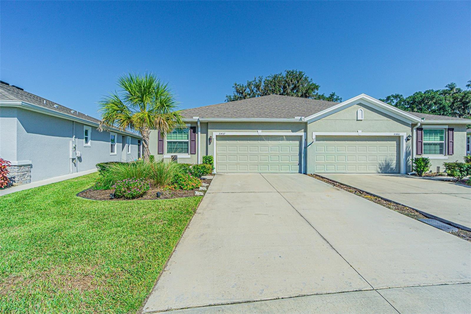 LIVE like you are on VACATION everyday in this Stunning Siesta floorplan villa in Mirada! This 3 bedroom, 2 bath, 2-car garage home offers 1,587 sq. ft. of living space on a rare OVERSIZED 10,000 sq. ft. pie-shaped PREMIUM lot with CONSERVATAION and WATER views. Features include lofty 9’4” ceilings, 18” tile in main areas, French doors to a flex/office, tray ceiling in the primary suite, and a screened lanai with breathtaking sunsets! The gourmet kitchen shines with 42” espresso staggered cabinets with crown molding, granite counters, subway backsplash, and stainless Whirlpool appliances. Additional upgrades: smart home system, washer/dryer with storage, new lighting, and garage shelving. Built by D.R. Horton, this villa was carefully designed with a bright open layout which makes entertaining a breeze. Tropical Bahama decor in the casually elegany primary suite features a tray ceiling, large windows overlooking conservation, plus a spa-like bath with granite counters, rubbed oil bronze fixtures, and ample storage. Additional upgrades include new lighting and ceiling fans, shelves added in the garage, and a utility closet with washer/dryer and overhead storage. The screened lanai offers breathtaking sunsets and serene views of two ponds and conservation, creating the perfect outdoor retreat to REST EASY! This smart home comes equipped with an ADT alarm, sprinkler system and D.R. Horton’s suite of connected home products, plus the convenience of maintenance-free living that includes exterior upkeep, lawn care, basic cable, internet, and trash service included so you have time to enjoy the amenities. At Mirada, you’ll enjoy a true “Live Where You Vacation” lifestyle, highlighted by the Metro Lagoon’s largest multi-acre Crystal Lagoon, featuring sandy beaches, swim-up bars, kayaking, paddle boarding, on-water obstacle courses, and cabanas. The community also boasts the Connected City infrastructure with the fastest Wi-Fi speeds in the nation, making it ideal for work, play, and everything in between. Conveniently located in San Antonio, Florida between Wesley Chapel and Historic Dade City, just North of Tampa. Easy access to major highways for easy commute to Shopping, restaurants, medical facilities, Ocala, Lakeland, Tampa, Orlando, Airports and Florida's famous Beaches! CALL TODAY!