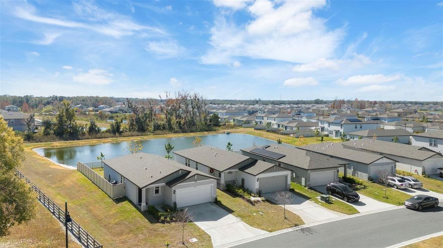 Welcome Home to North Park East with a newer 2024 Built home with a gorgeous pond view at the end of the access road for lots of extra space and easy access to main roads.  The home comes with a FULLY FENCED YARD with a waterfront view, WATER TREATMENT SYSTEM already in place & GENERATOR Direct connection if its ever needed for back up power options. The home has an open layout with high ceilings and a split floor plan with the kitchen at the center of the home. The kitchen features a large center granite island, pantry closet and stainless appliances.  There is also a separate indoor laundry room to keep all the laundry tucked away. The master bedroom is complete with double granite counter vanity, walk in closet, step in shower and separate toilet room for privacy.  North Park East has an amazing location conveniently located 1 mile from I4 between Tampa and Orlando for access to everything!  The community has a fabulous community park with playground, community pool, dog park, sports fields and covered seating areas for small parties.  Lots of walking trails in the community and adjacent to the McIntosh Preserve park for lots of nature trails. There are 3 new schools in process of being built within 1/2 mile from the community and new shopping plazas already being built as well as the new hospital for easy access to everything. Plant City is the Winter Strawberry Capital of the world and an amazing place for families with lots of community events and parades throughout the year.  Small town living with access to major cities within 20 minutes and beaches about 45 min away!  The home is easy to see and has upgrades already included!  Schedule your tour today!