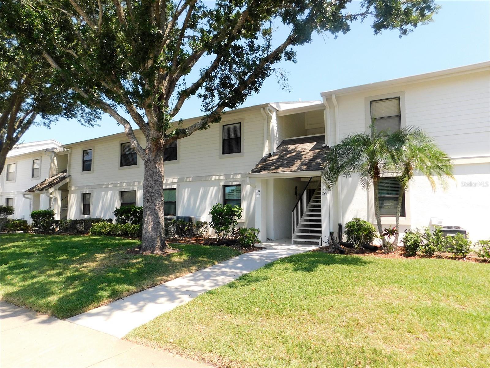 Rest and relaxation are the 'key' to this beautifully decorated first floor condo. Tile flooring thru out the living area with comfortable setting to watch your flat screen tv or out to the glass enclosed lanai to enjoy your new book! Dining area to set up a more formal table or grab a bite in the eat in kitchen area. Kitchen has stainless appliances, breakfast bar overlooking the dining/living area. Split bedroom plan. Master bedroom with queen size bed, TV, walk in closet and sliders out to the lanai (where the washer & dryer are located in the utility closet). Master bath with tiled walk-in shower. Guest bedroom with twin beds, TV and guest bath with tub/shower combination. This is a non-smoking residence, and all short-term rentals are subject to a 13% sales/tourist tax. Water, sewer, trash, internet, basic cable and up to $100 in electric is included in the rent. Please call for availability.