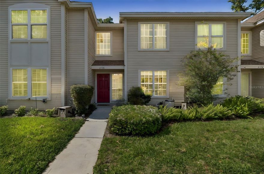 Carefree living community of GlenEagles… This two story townhome offers 2 bedrooms, 1 ½ bathrooms with nearly 1,200 sq ft. Gorgeous, easy care Luxury Vinyl Flooring (2025) throughout the townhome. This open concept great room floor plan features spacious dining and living areas with upgraded light fixture and ceiling fan. Sliding glass doors lead to the outdoor screen enclosed lanai which extends your living and entertaining space. A perfect setting for morning coffee or relaxing evening. Additional expansive closet for storage is located on the outdoor lanai. The kitchen offers tons of counter space for cooking and entertaining and features stainless steel appliances including range, dishwasher (2025), refrigerator and countertop microwave. Plenty of space for an eat-in area within the kitchen as well as the breakfast bar seating. A convenient half bath is located on the first floor for your guests and additional under the staircase storage is a hidden gem. On the second floor, you will find the convenient hallway laundry closet featuring washer and dryer which is generously included. Both bedrooms are located on the second floor. The spacious primary bedroom boasts a full walk-in closet and soaring vaulted ceilings and a single long vanity for the primary bedroom's personal use. Through the door you will enter into the Jack N Jill bathroom with an additional single long vanity, toilet and tub/shower combination. Second bedroom is adjacent the bathroom and features a wall closet and ceiling fan. GlenEagles is a well-kept community in desirable Palm Harbor. HOA fee includes Cable TV, Exterior and Grounds maintenance, Community Pool, and Trash. Pet friendly community.  One assigned parking space with plenty of guest parking. Close to shopping, restaurants and medical, easy access to the Pinellas Trail, and of course the famed Gulf beaches are nearby.