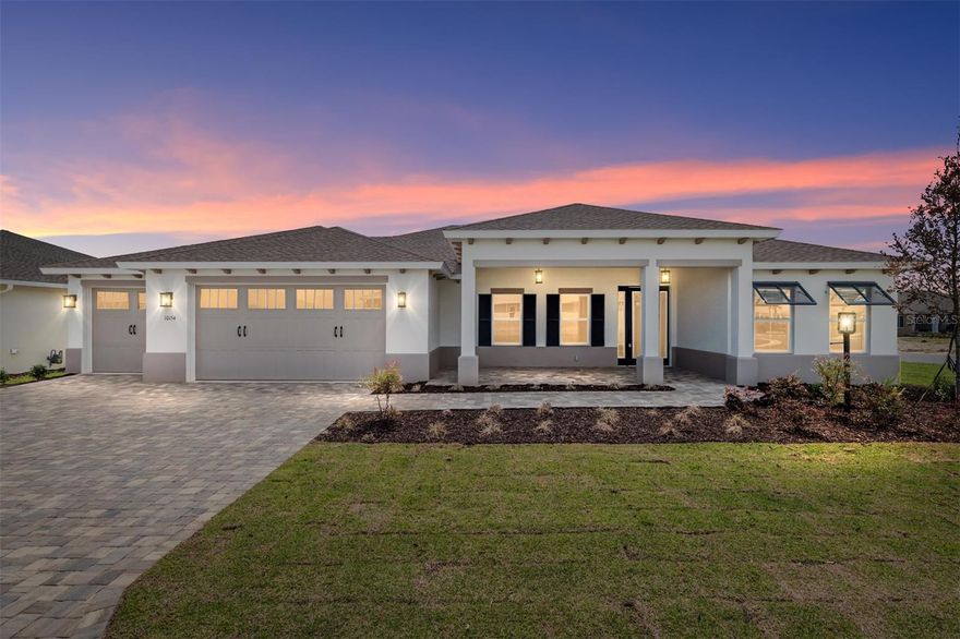 Welcome to refined, low-maintenance living in Candler Hills at On Top of the World. Perfectly positioned on a desirable corner lot, this beautifully designed Brighton model offers comfort, style, and thoughtful upgrades throughout.

This inviting home features 2 bedrooms, 2 baths, and a golf cart garage, along with a versatile layout ideal for both everyday living and entertaining. Enter through the charming covered front porch into a welcoming foyer that opens to a spacious living room filled with natural light.

The well-appointed kitchen is a standout, featuring classic subway tile backsplash, built-in ovens, ample cabinetry, and a functional layout that flows seamlessly into the breakfast area—perfect for casual dining.

A flex room with elegant French doors provides the perfect space for a home office, den, or guest area. The private owner’s suite offers a peaceful retreat with a generous walk-in closet and en-suite bath, while the secondary bedroom and bath are thoughtfully positioned for guest privacy.

Enjoy indoor-outdoor living with a covered lanai, ideal for relaxing and enjoying Florida’s year-round sunshine. A dedicated laundry suite and golf cart garage add everyday convenience and functionality.

Located within a premier active adult community, residents enjoy access to golf, resort-style pools, fitness centers, dining, and a vibrant social lifestyle.