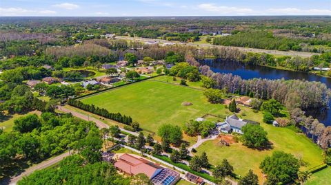 Photo of 820 Newberger Road, Lutz, FL 33549 (MLS # TB8497037)